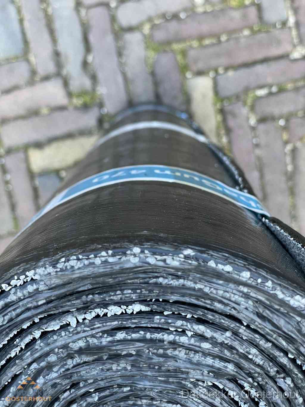 Rol bitumen dakleer met leislag voor plat dak in Oosterhout